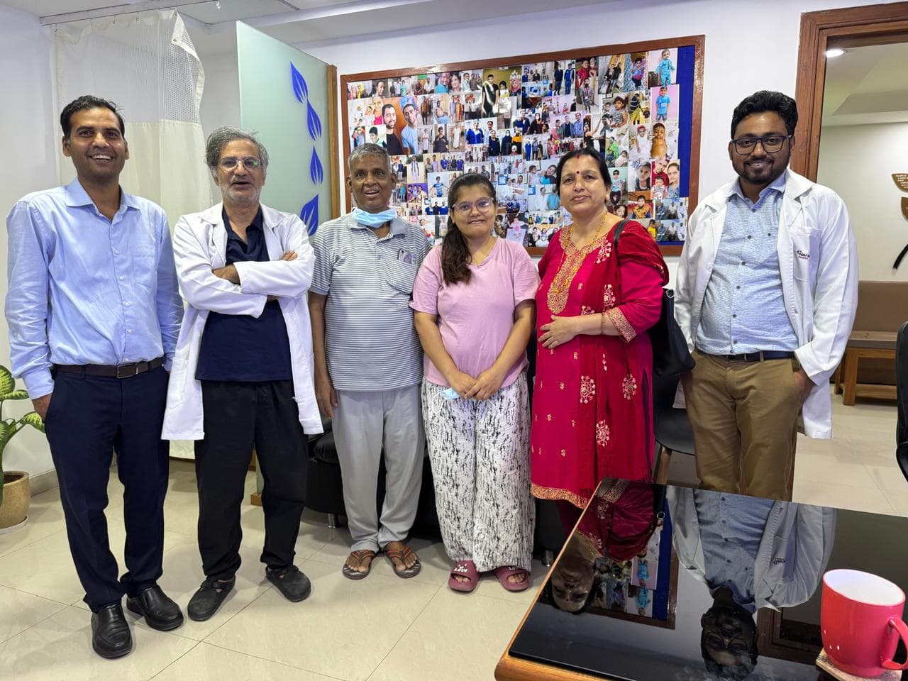 Doctor with patients and colleagues